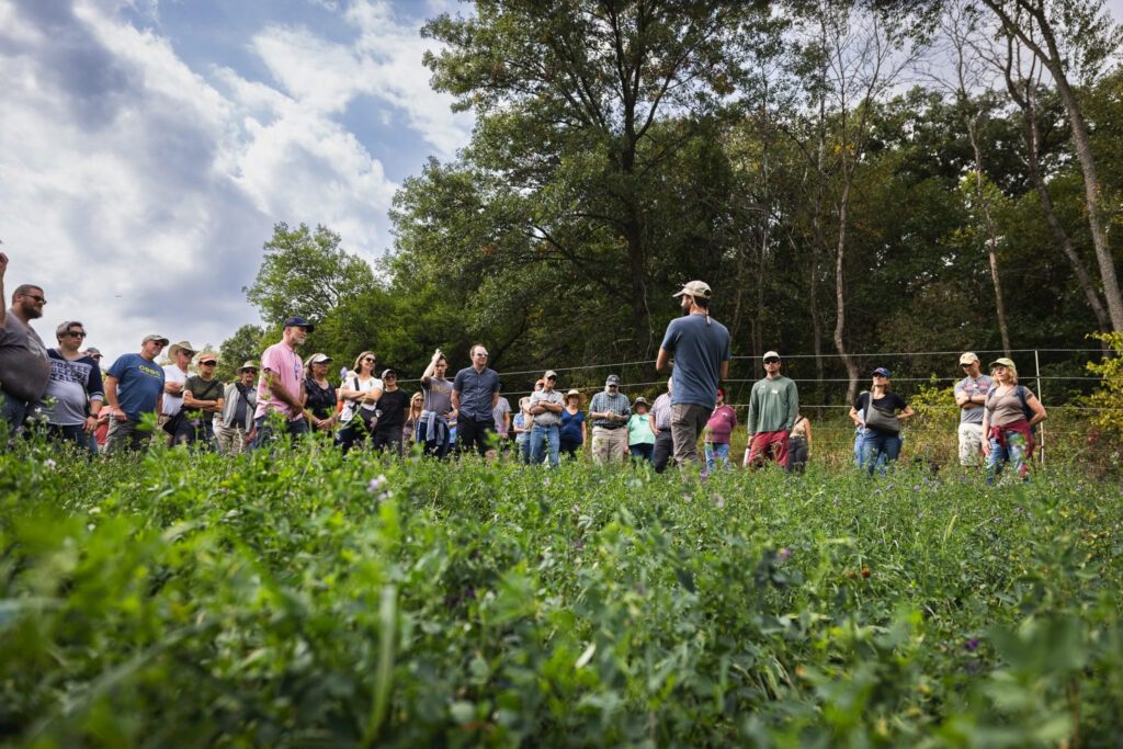 Savanna Institute Open House attendees touring the farm.